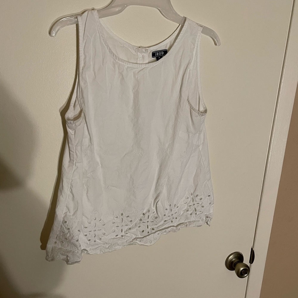 White tank top with key holes along the bottom